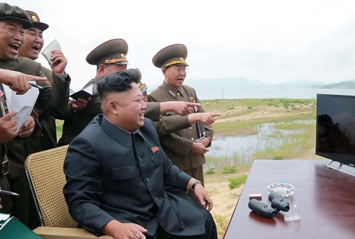 North-Korea-Kim-Jong-un-Laugh-With-Military-Looking-at-Computer-Screen.jpg